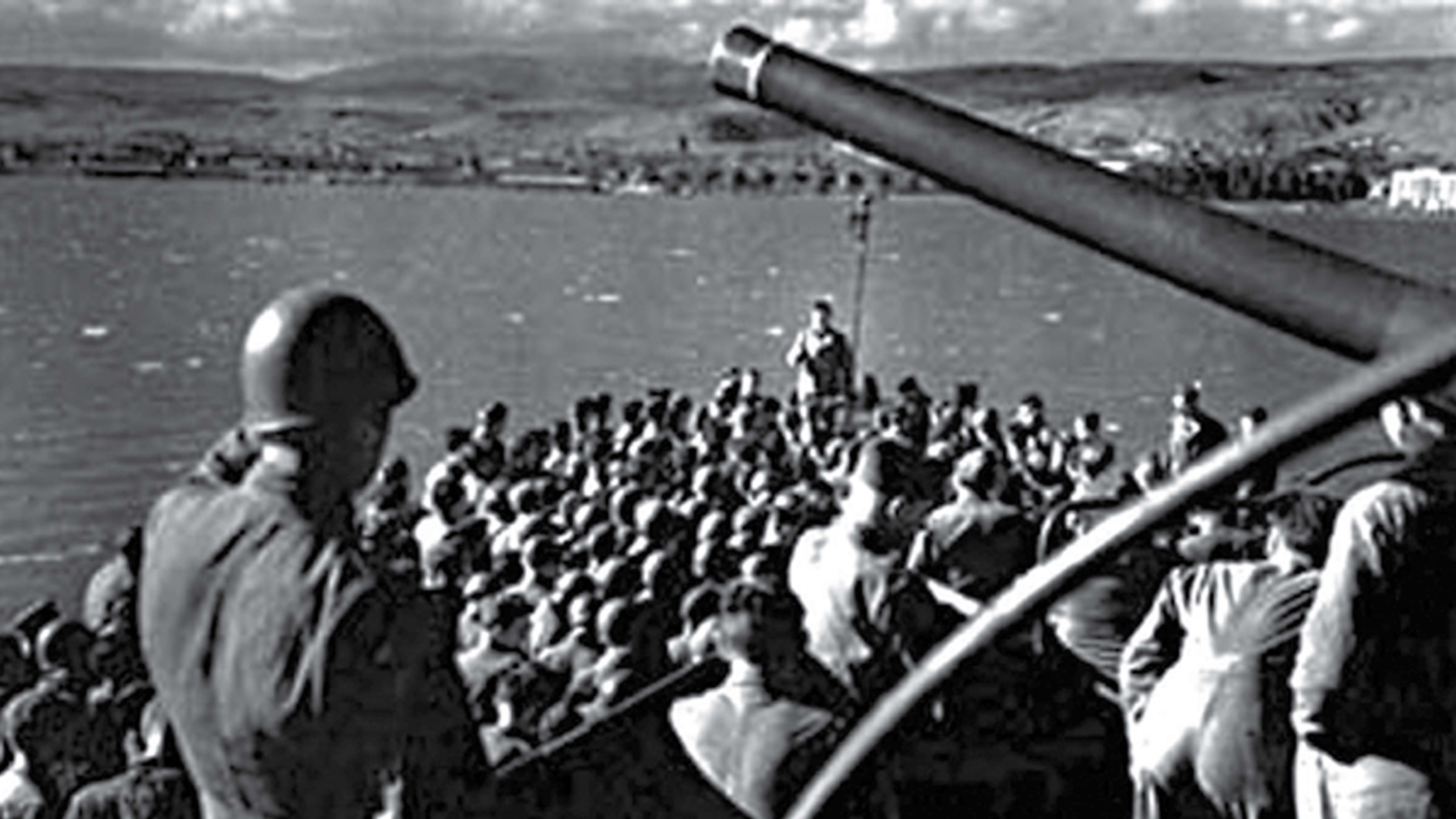 Lt. Col. Darby (standing center back) addressing the Rangers at the beginning of the crossing to Sicily, 9 July 1943. The Rangers landed at Gela on July 10, 1943.