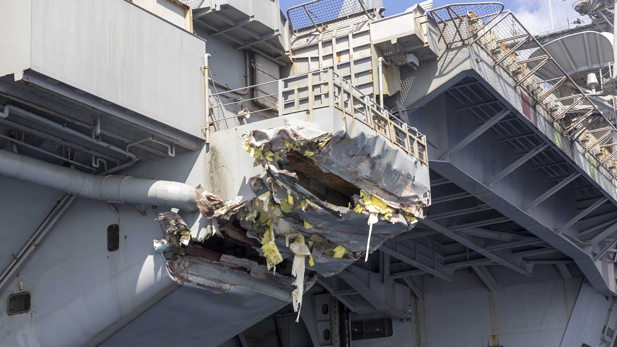 250213-N-AJ005-1044 MEDITERRANEAN SEA (Feb. 13, 2025) Exterior damage of USS Harry S. Truman (CVN 75) viewed from a ship’s rigid-hull inflatable boat following a collision with merchant vessel Besiktas-M, Feb. 12, while operating in the vicinity of Port Said, Egypt. USS Harry S. Truman, the flagship of the Harry S. Truman Carrier Strike Group (HSTCSG), is on a scheduled deployment in the U.S. 6th Fleet area of operations supporting U.S. Naval Forces Europe-Africa to defend U.S., Allied and partner interests. (U.S. Navy photo by Mass Communication Specialist 1st Class Cody Beam)