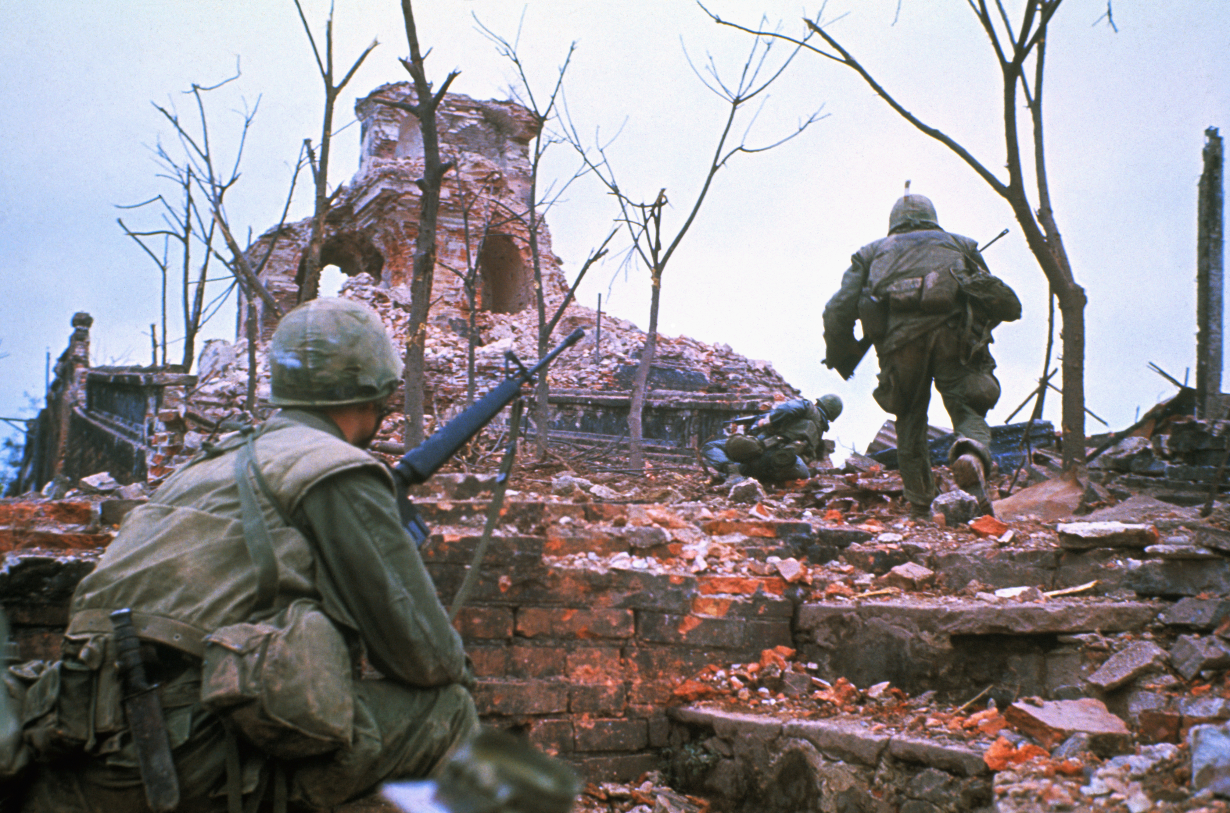 2/13/1968- Hue, South Vietnam: Vietcong attack. US Marines advance up and over outer wall of the Citadel.