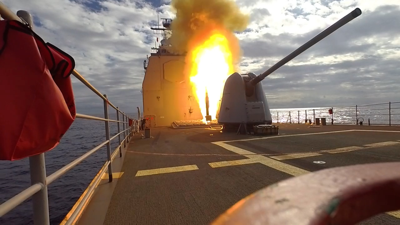 Navy ship firing a missile