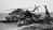 A photo of a crashed U.S. helicopter from Operation Eagle Claw.