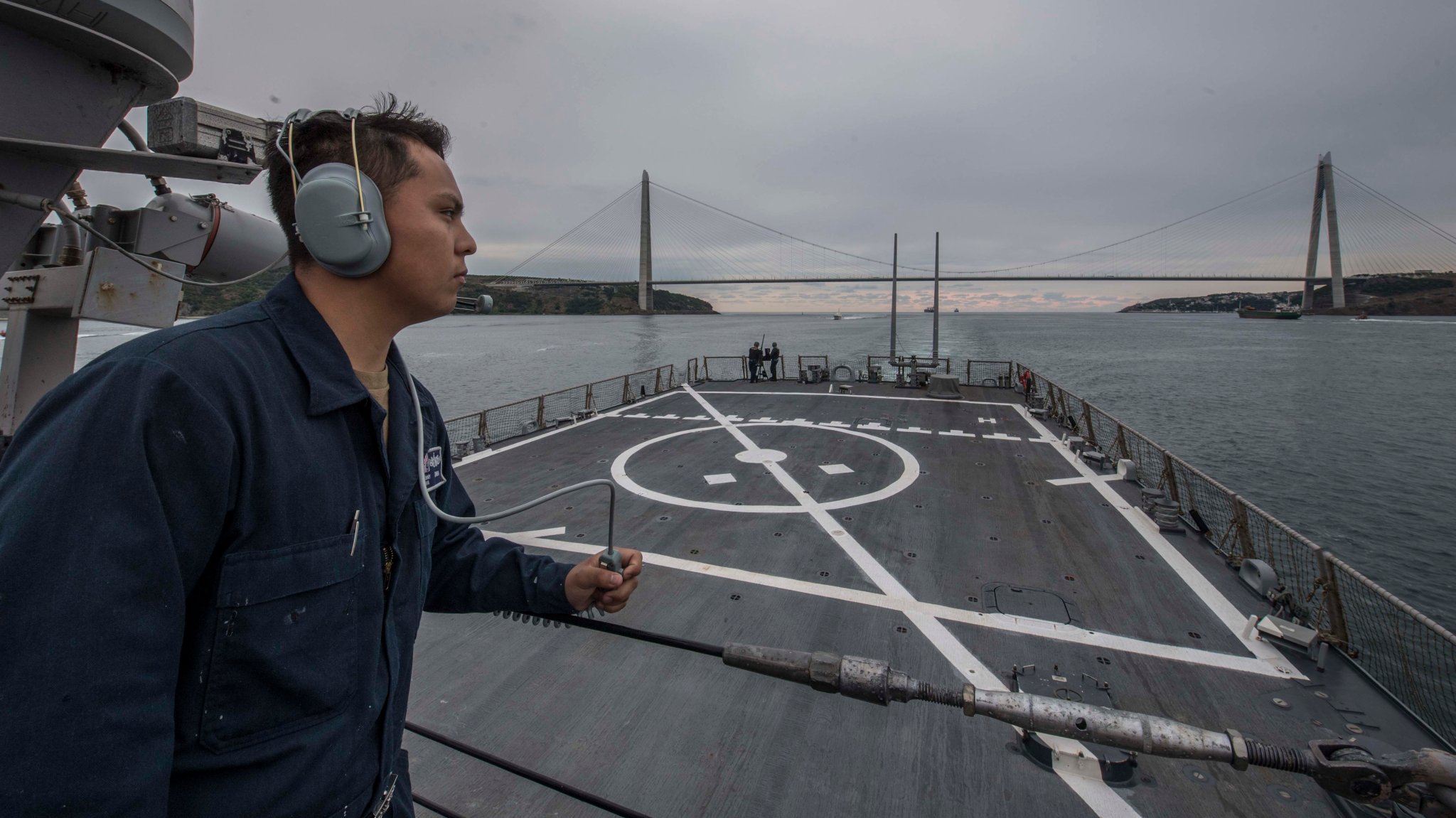 190714-N-TI693-0097 BLACK SEA (July 14, 2019) - Operations Specialist Seaman Raymond Zumba, from New York, stands watch as aft lookout during a straits transit en route to the Mediterranean Sea, July 14, 2019. Carney, forward-deployed to Rota, Spain, is on its sixth patrol in the U.S. 6th Fleet area of operations in support of regional allies and partners as well as U.S. national security interests in Europe and Africa. (U.S. Navy photo by Mass Communication Specialist 1st Class Fred Gray IV/Released)