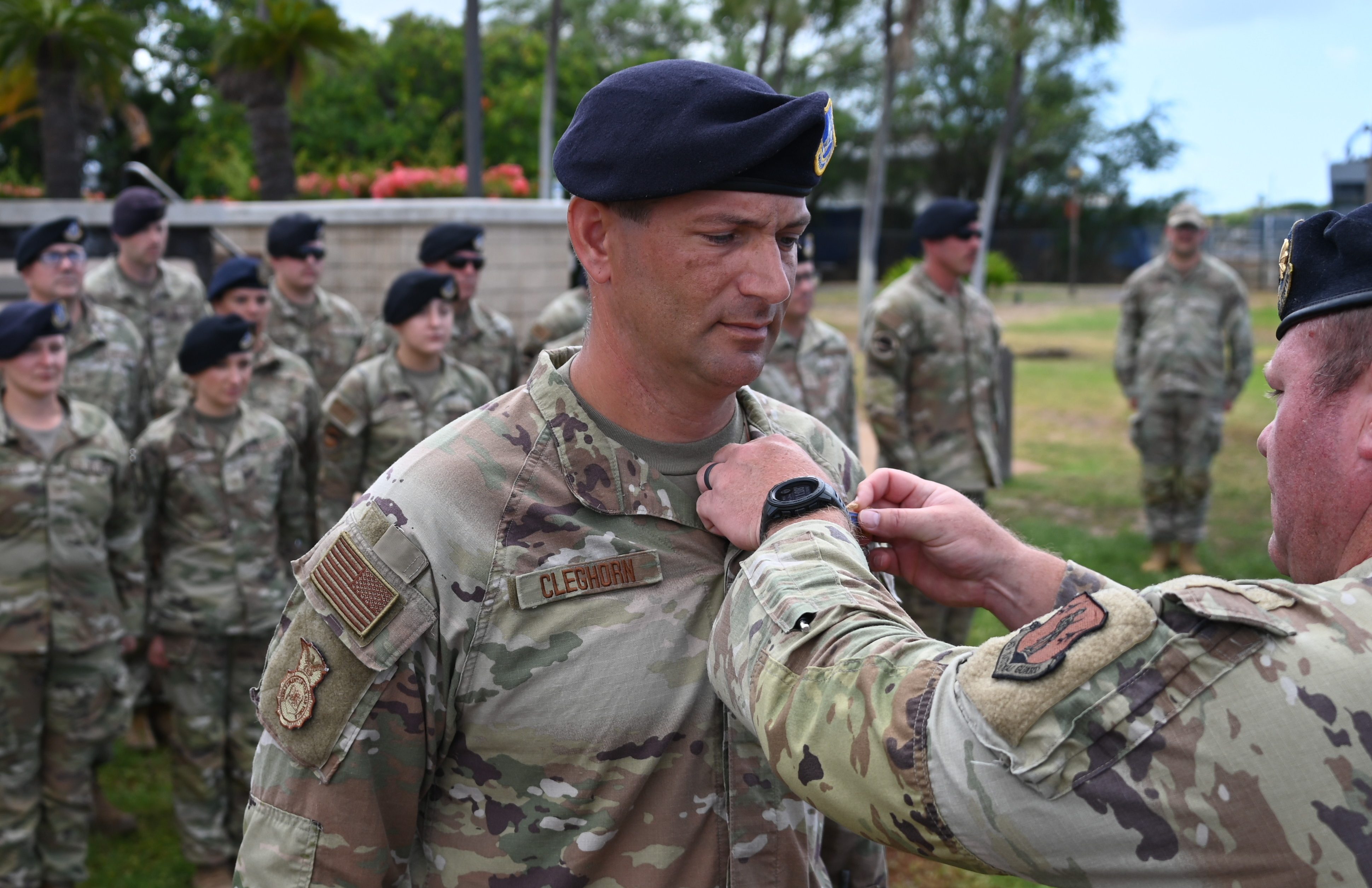Iowa Air National Guard Security Forces manager SMSgt Greg Cleghorn recieves Master Infantry Badge during annual training at Joint Base Hickam Pearl Harbor 18 Aug 2025. (Air National Guard photo by Staff Sgt. John Johnson) (Photo cropped and edited to emphasize subject)
