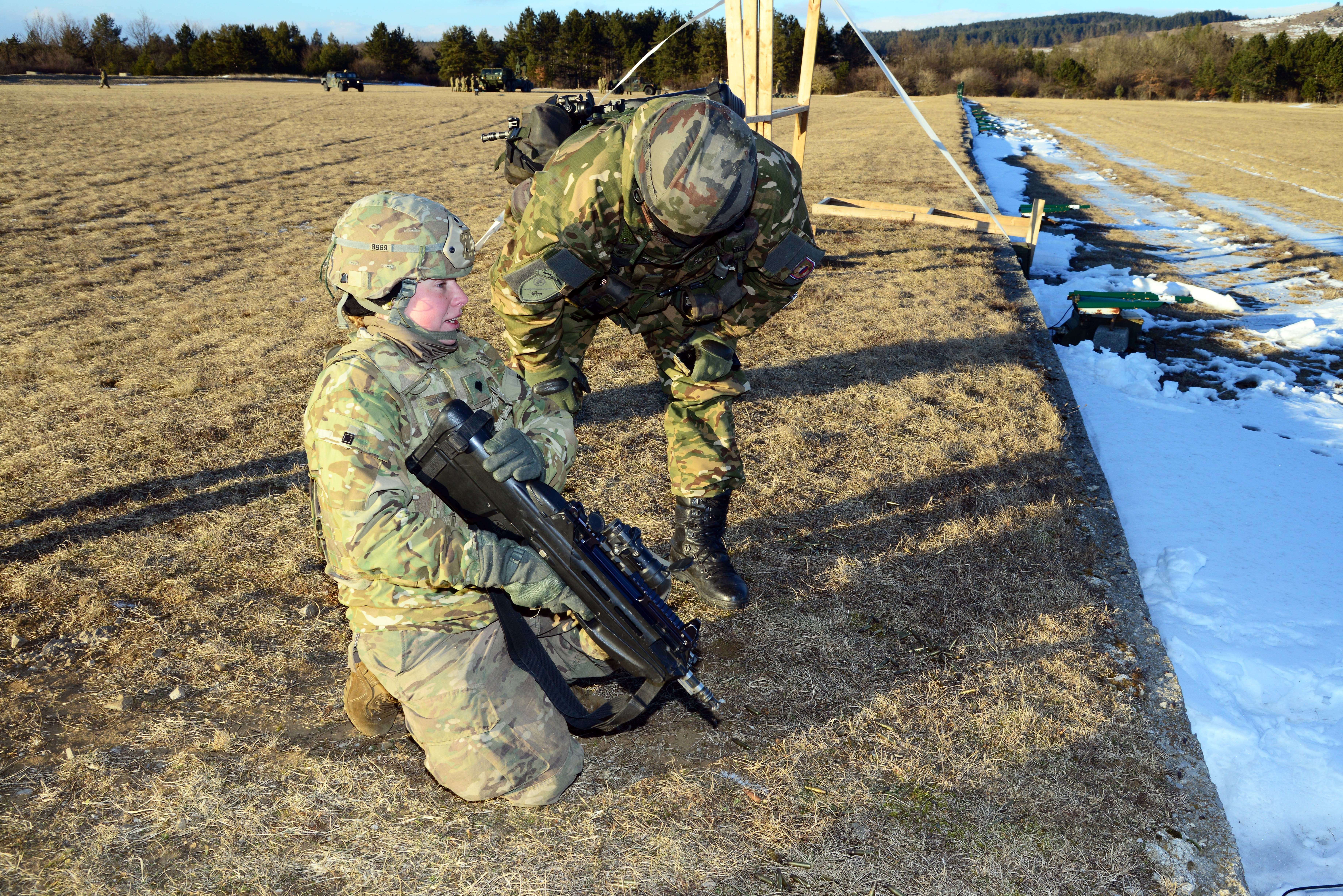 U.S. Army paratroopers from the 173rd Brigade Support Battalion, 173rd Airborne Brigade and Slovenian soldiers cross-train on the M4 carbine rifles and FN F2000 assault rifles during exercise Lipizzaner III in Bac, Slovenia, on Jan. 26, 2017. Lipizzaner is a combined squad-level training exercise in preparation for platoon evaluation, and to validate battalion-level deployment procedures. (Photo by Visual Information Specialist Massimo Bovo/released)