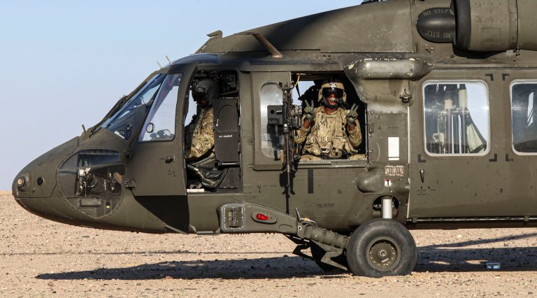 Paratroopers assigned to the 82nd Combat Aviation Brigade, 82nd Airborne Division, conduct a UH-60 Black Hawk aerial gunnery range at Camp Buehring, Kuwait, on April 2, 2024. Aerial gunnery ranges are used to train and progress Paratroopers on their day and night shooting qualifications. (U.S. Army photo by Staff Sgt. Catessa Palone)