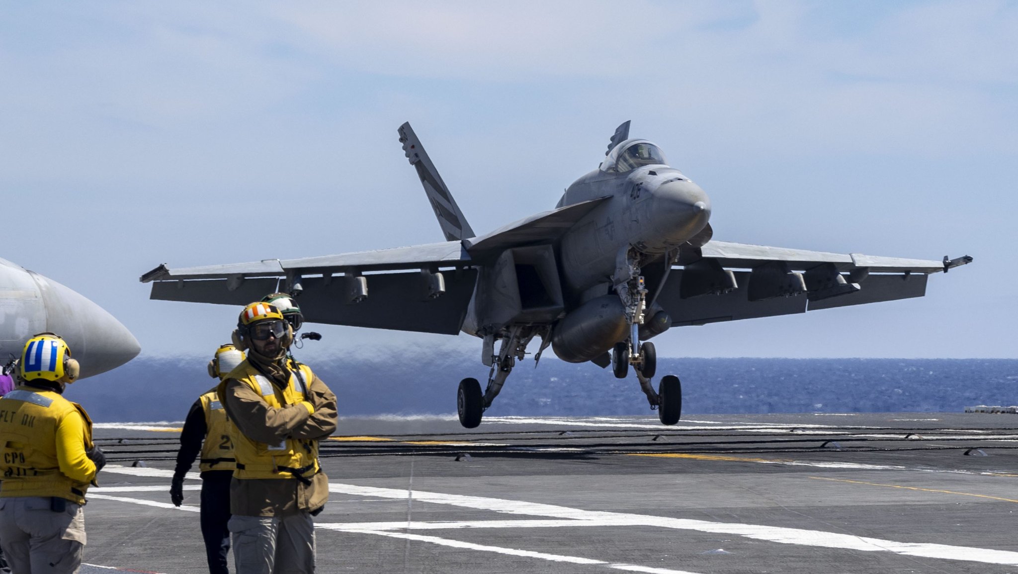 250726-N-GC617-1241 PACIFIC OCEAN (July 26, 2025) An F/A-18E Super Hornet, attached to Strike Fighter Squadron (VFA) 151, makes an arrested landing on the flight deck of the Nimitz-class aircraft carrier USS Abraham Lincoln (CVN 72). Abraham Lincoln, flagship of Carrier Strike Group Three, is underway conducting routine training operations in the U.S. 3rd Fleet area of operations. As an integral part of U.S. Pacific Fleet, Commander, U.S. 3rd Fleet operates naval forces in the Indo-Pacific and provides the realistic and relevant training to ensure the readiness necessary to execute the U.S. Navy’s timeless role across the full spectrum of military operations. (U.S. Navy photo by Mass Communication Specialist Seaman Shepard Fosdyke-Jackson)