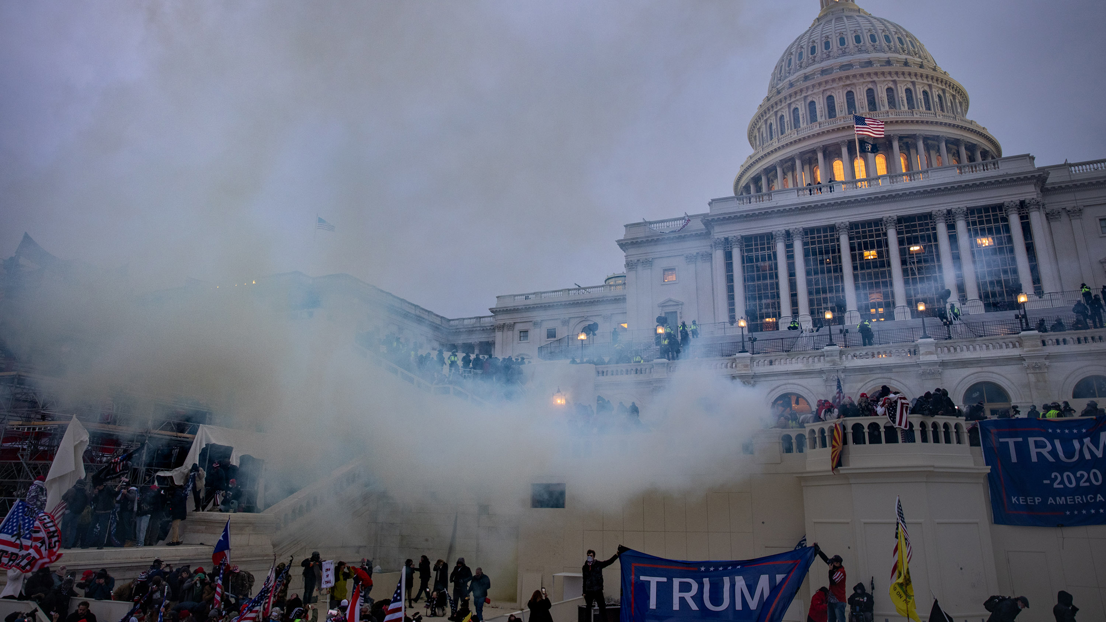 WASHINGTON,DC-JAN6: Tear gas is fired at supporters of President Trump who stormed the United States Capitol building. (Photo by Evelyn Hockstein/For The Washington Post via Getty Images)