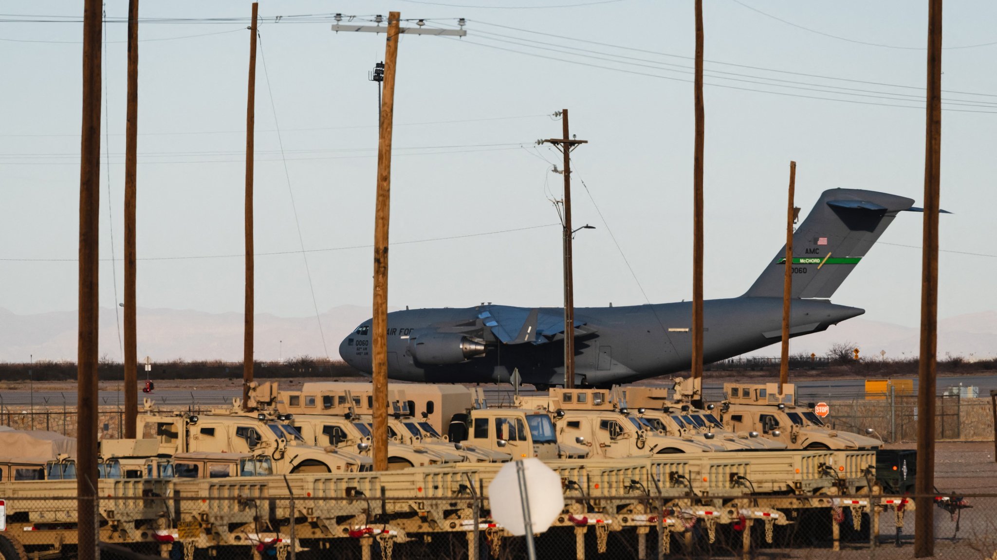 A United States Air Force Boeing C-17 used for deportation flights is pictured at Biggs Army Airfield in Fort Bliss, El Paso, Texas on February 13, 2025. Trump has been unhappy with the number of arrests so far and has directed federal immigration officials to meet higher detention quotas, the Washington Post reported. It said he was ordering ICE to raise the arrest numbers from a few hundred a day to at least 1,200 to 1,500, citing people with knowledge of internal briefings. (Photo by Justin Hamel / AFP) (Photo by JUSTIN HAMEL/AFP via Getty Images)