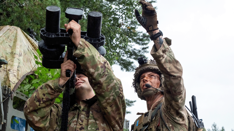 A soldier uses the KnightFigher drone jamming device during Project Flytrap, July 28, 2025.
