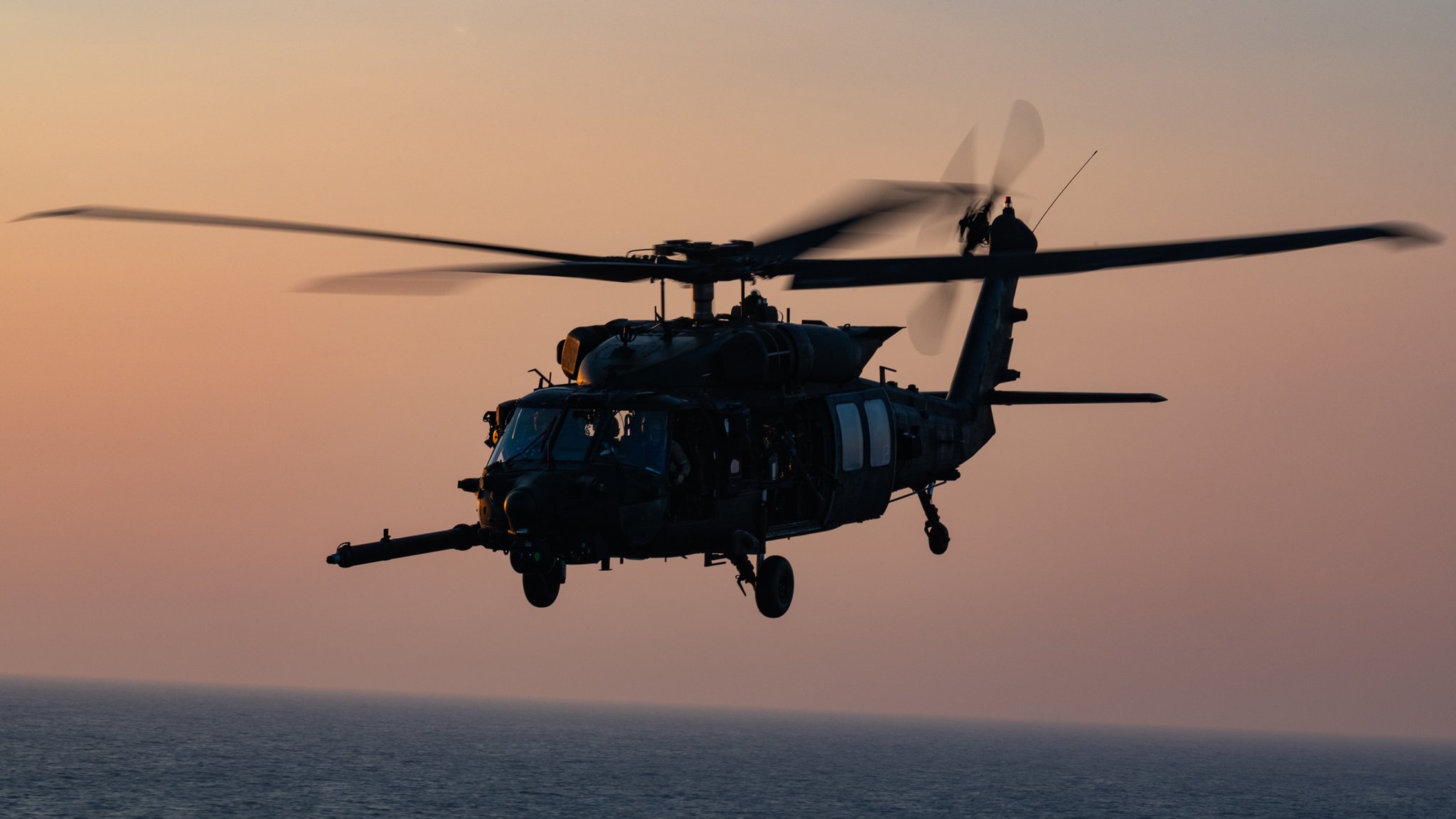 A U.S. Army MH-60 Black Hawk helicopter assigned to the 160th Special Operations Aviation Regiment (Airborne) conducts a low-level flight during Exercise Balikatan 25 over the Philippine Sea, April 25, 2025. Balikatan is a longstanding annual exercise between the Armed Forces of the Philippines and U.S. military designed to strengthen our ironclad alliance, improve our capable combined force, and demonstrate our commitment to regional security and stability. (U.S. Air Force photo by Senior Airman Ty Pilgrim)