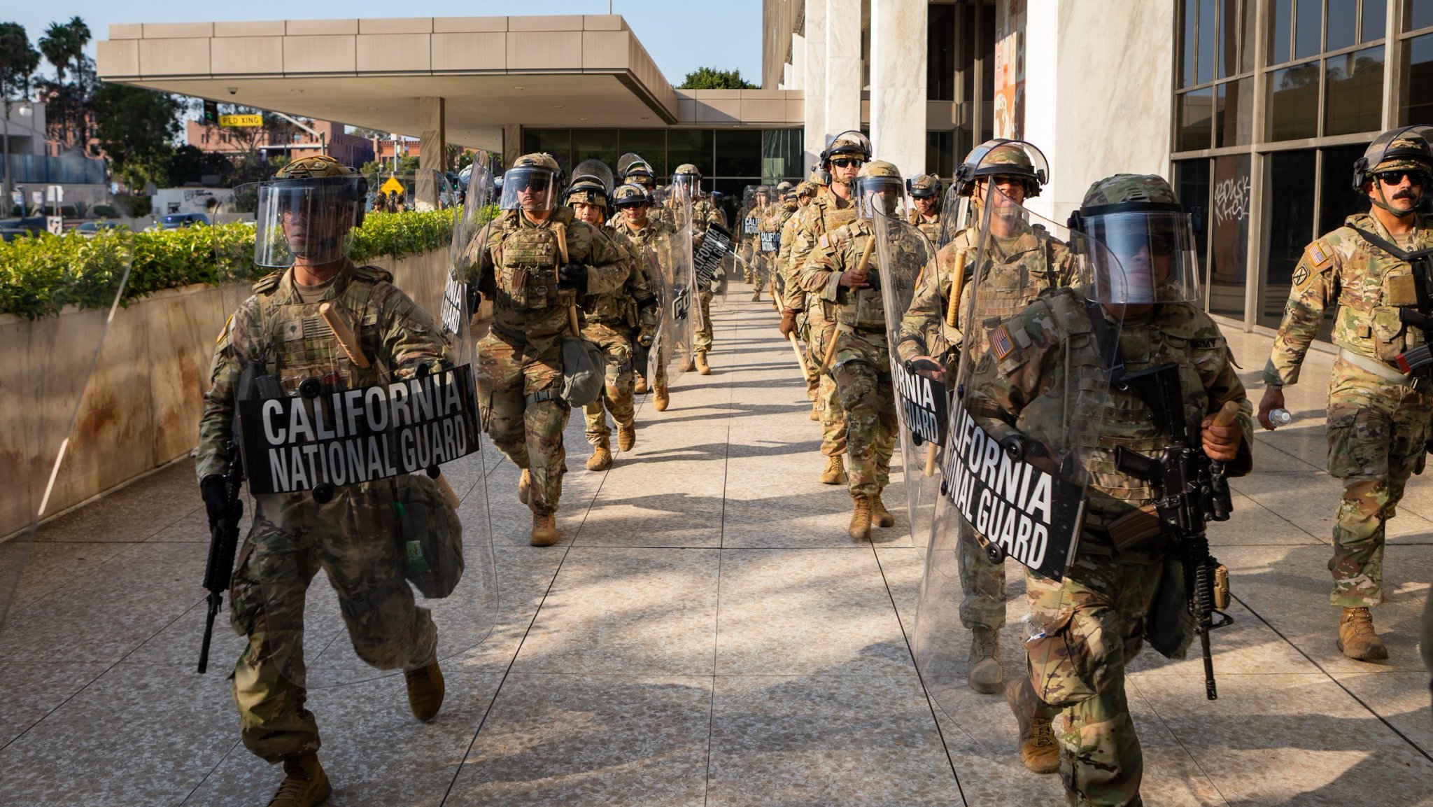Soldiers from the 1st Battalion, 185th Infantry Regiment, 79th Infantry Brigade Combat Team in a Title 10 status protect a Los Angeles Federal Building and federal personnel in Los Angeles, Calif., June 9, 2025. Approximately 2,000 National Guard forces are supporting the protection of federal personnel and federal property in the greater Los Angeles area. (Department of Defense photo by Capt. Alex Werden)