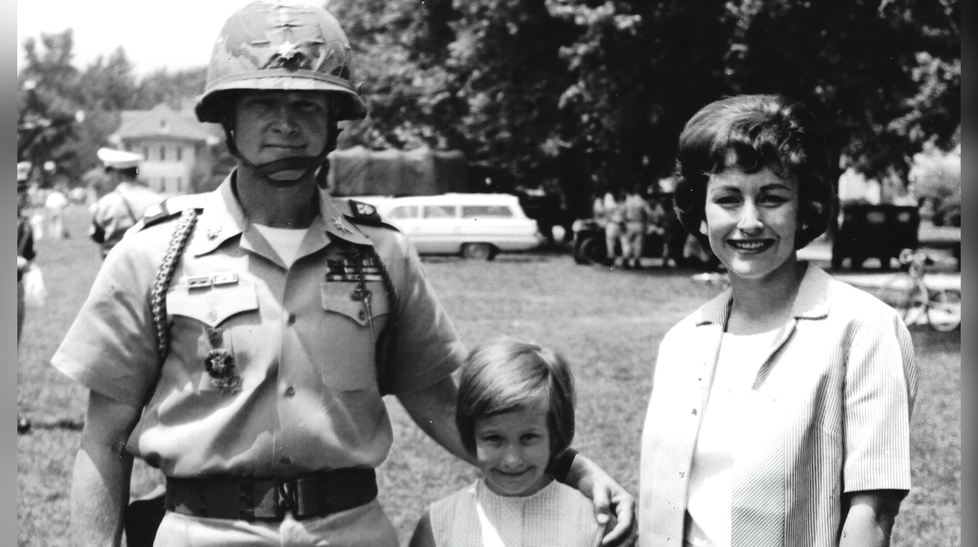 Hal Moore in uniform with his daughter Julie and wife Julia in 1965.