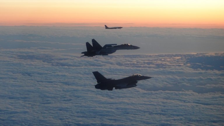A North American Aerospace Defense Command F-16 Fighting Falcon fighter aircraft escorts a Russian Su-35 Flanker and Tu-95 Bear bomber through the Alaskan Air Defense Identification Zone over the Bering Sea on Sept. 24, 2025.