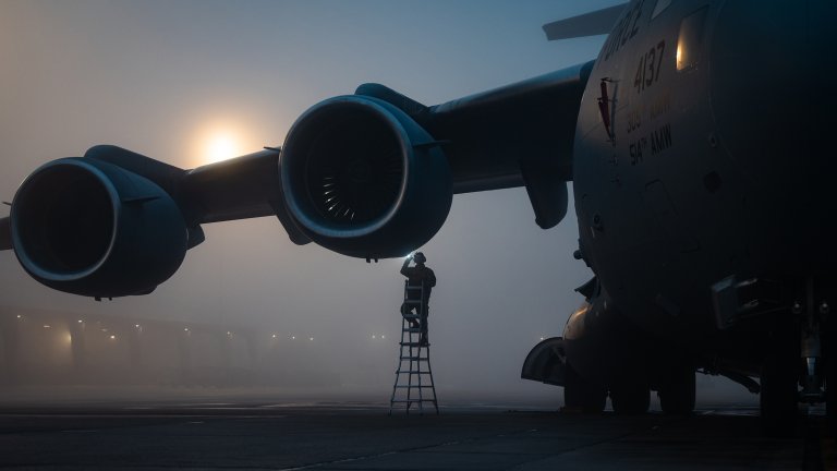 U.S. Air Force Senior Airman Hector Orenga, 305th Air Mobility Wing crew chief, conducts engine inspections on a C-17 Globemaster III at Joint Base McGuire-Dix-Lakehurst, N.J., Jan. 24, 2024. The C-17 is capable of rapid strategic delivery of troops and all types of cargo to main operating bases or directly to forward bases in deployed areas. (U.S. Air Force photo by Senior Airman Sergio Avalos)