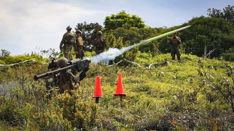 U.S. Marine Corps Lance Cpl. Isaac Reigstad, a low altitude air defense gunner with 1st Low Altitude Air Defense Battalion, Marine Air Control Group 18, 1st Marine Aircraft Wing, fires a FIM-92 Stinger during exercise Tenacious Archer 25, at Koror, Palau, Aug. 17, 2025. This exercise included training on Integrated Air and Missile Defense systems with live-fire events, increasing interoperability, promoting regional security and stability, and supporting a free and open Indo-Pacific. (U.S. Marine Corps photo by Lance Cpl. Carlos Daniel Chavez-Flores)