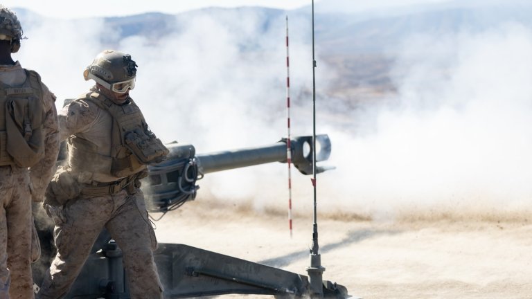 U.S. Marines with 1st Battalion, 11th Marine Regiment fire an M777A2 lightweight 155 mm howitzer as part of a direct fire mission on Range 407A at Marine Corps Camp Pendleton, California, Sept. 16, 2025. 1st Bn., 11th Marines conducted an artillery firing exercise to maintain their combat proficiency in realistic combat scenarios. (U.S. Marine Corps photo by Cpl. Sawyer Carleton)