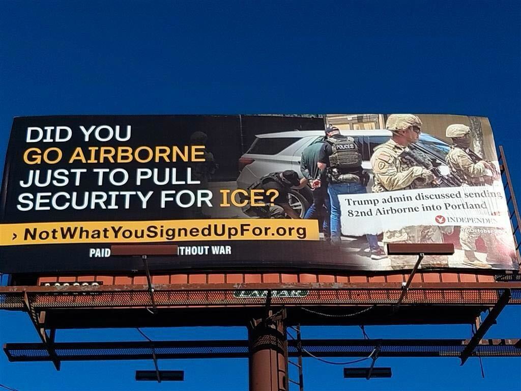 A new billboard near Fort Bragg, North Carolina, highlights a news article about President Donald Trump reportedly considering sending 82nd Airborne Division soldiers into Portland, Oregon. Those soldiers are stationed at the North Carolina base. Photo courtesy of Win Without War.