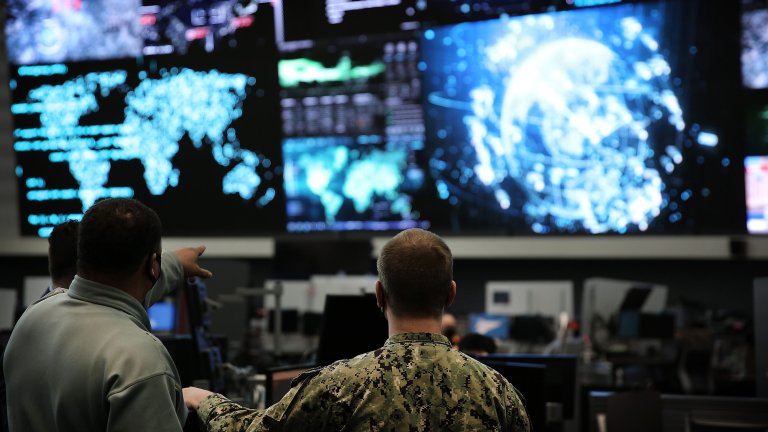 Personnel with U.S. Cyber Command work in the Integrated Cyber Center, Joint Operations Center at Fort George G. Meade, Maryland on April 2, 2021. Army photo by Josef Cole.