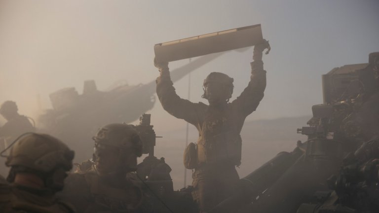 U.S. Marines with 2nd Battalion, 11th Marine Regiment, 1st Marine Division, reload an M777 lightweight 155mm howitzer during a rehearsal for the 250th Amphibious Capabilities Demonstration at Red Beach combat town, Marine Corps Base Camp Pendleton, Oct. 17, 2025. The 250th Amphibious Capabilities Demonstration at Camp Pendleton marks the Marine Corps’ 250th birthday and America’s Semiquincentennial. The live-fire event highlights the Navy-Marine Corps team’s ability to integrate across air, land, and sea, showcasing the Corps’ enduring role as America’s force in-readiness. (U.S. Marine Corps photo by Gunnery Sgt. Aaron S. Patterson)