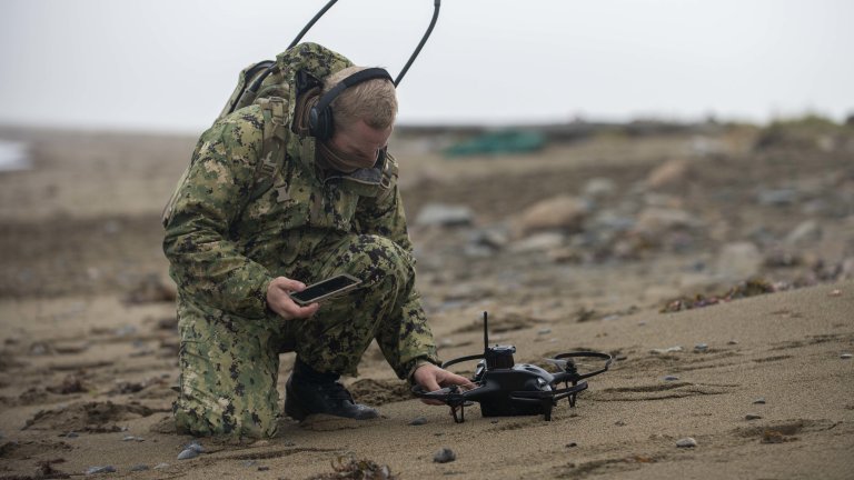 SAINT LAWRENCE ISLAND, Alaska (Sept. 11, 2022) A West Coast-based Naval Special Warfare operator conducts security utilizing a SHIELD AI Nova I drone during Operation Noble Defender. Sensors, artificial intelligence, and machine learning software capabilities coupled with the development of layered denial, and defeat mechanisms capable of addressing current and emerging threats are fundamental to national defense. (U.S. Navy photo by Mass Communication Specialist 1st Class Alex Smedegard)