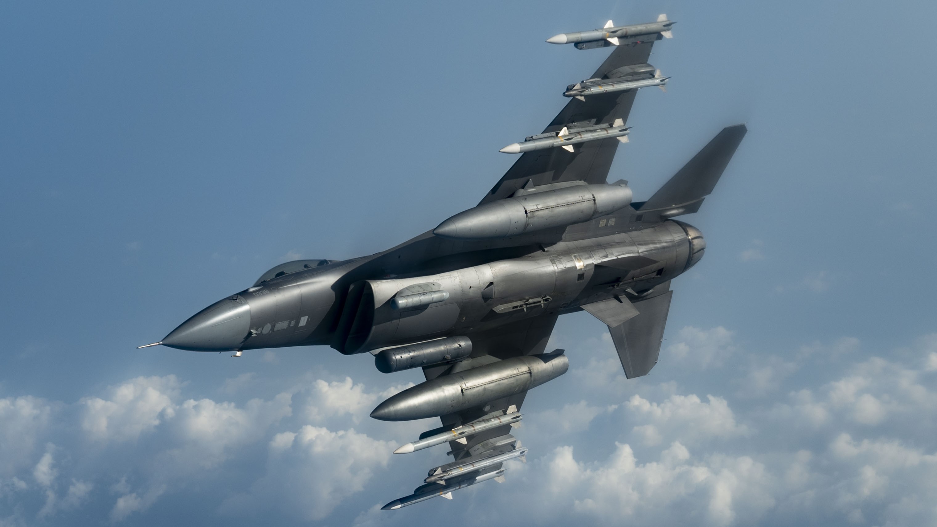 F-16 - A U.S. Air Force F-16 Fighting Falcon flies over the U.S. Central Command area of responsibility Nov. 20, 2024. The Fighting Falcon delivers airpower while defending the region with precise and lethal force. (U.S. Air Force photo by Staff Sgt. William Rio Rosado)