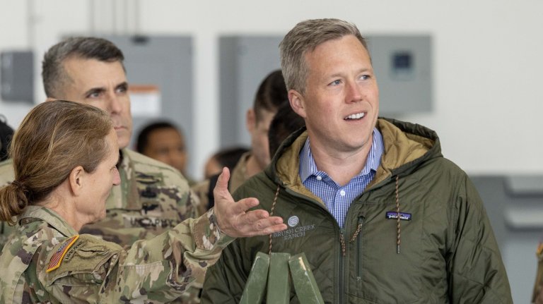 Maj. Gen. Michelle A. Schmidt, the commanding general of the 7th Infantry Division, engages in conversation with the Honorable Dan Driscoll, the 26th Secretary of the Army, at the hangar of the 2nd Assault Helicopter Battalion, 158th Aviation Regiment, 16th Combat Aviation Brigade, at Joint Base Lewis-McChord, Washington, March 10, 2025. During Driscoll's visit to JBLM, a static display was set up to showcase the power capabilities of I Corps. (U.S. Army photo by Sgt. Brandon Bruer)