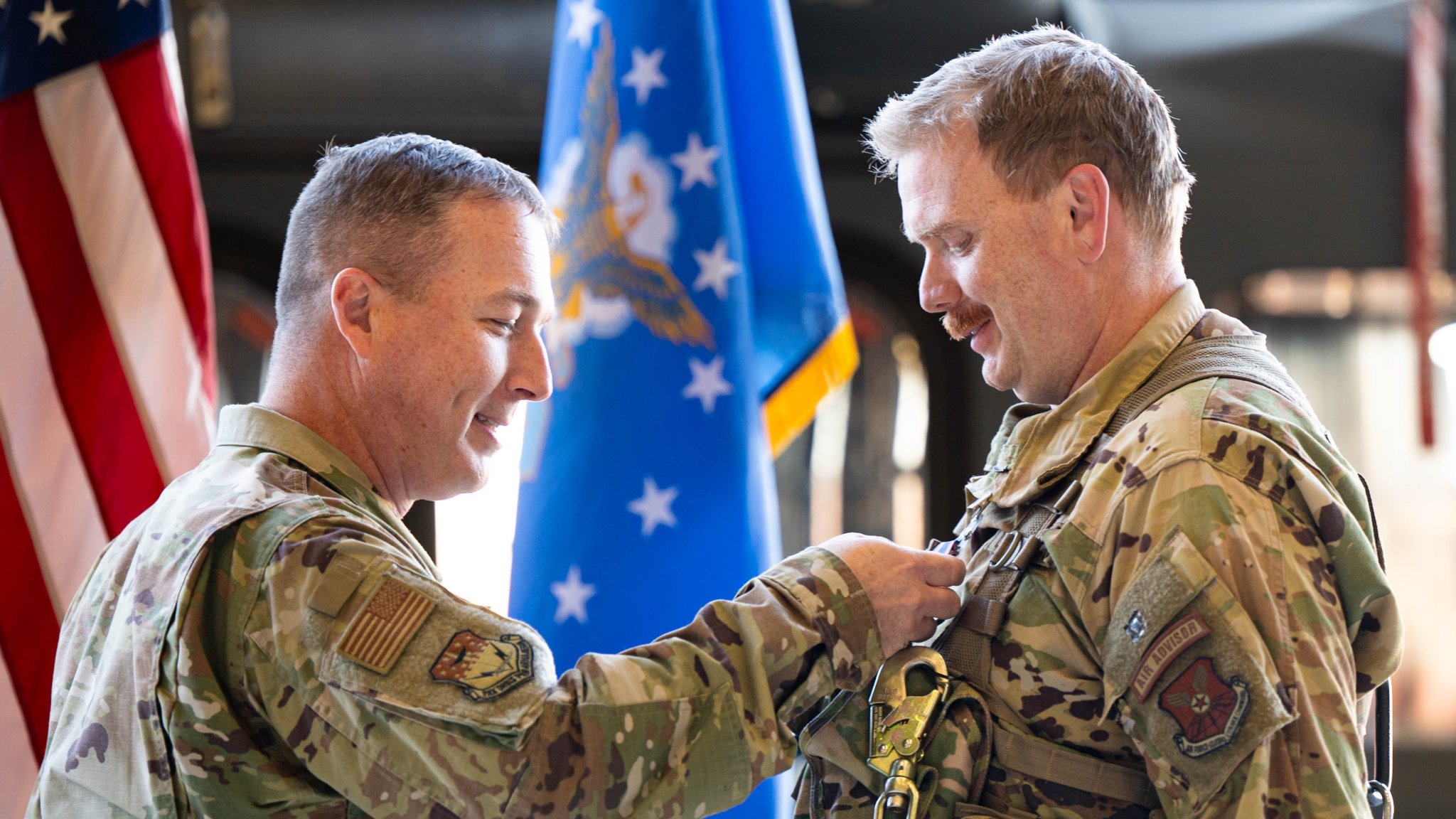 Image:  Col. Daniel Voorhies, 341st Missile Wing commander, pins 20th Air Force’s first-ever Air Medal on Maj. Collin Urbanowicz, 341st Medical Group aeromedical physician assistant, at Malmstrom Air Force Base, Montana, Nov. 20, 2025. The Air Medal recognizes meritorious achievement or heroism during aerial flight, acknowledging performance beyond standard expectations. (U.S. Air Force photo by Staff Sgt. Mary Bowers) 