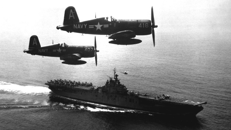 Four F4U Corsair fighter airplanes return from a combat mission over North Korea and circle the aircraft carrier USS Boxer while waiting for the planes in the next strike force to launch from the deck, September 1951. US Navy photo. (Photo by Interim Archives/Getty Images)