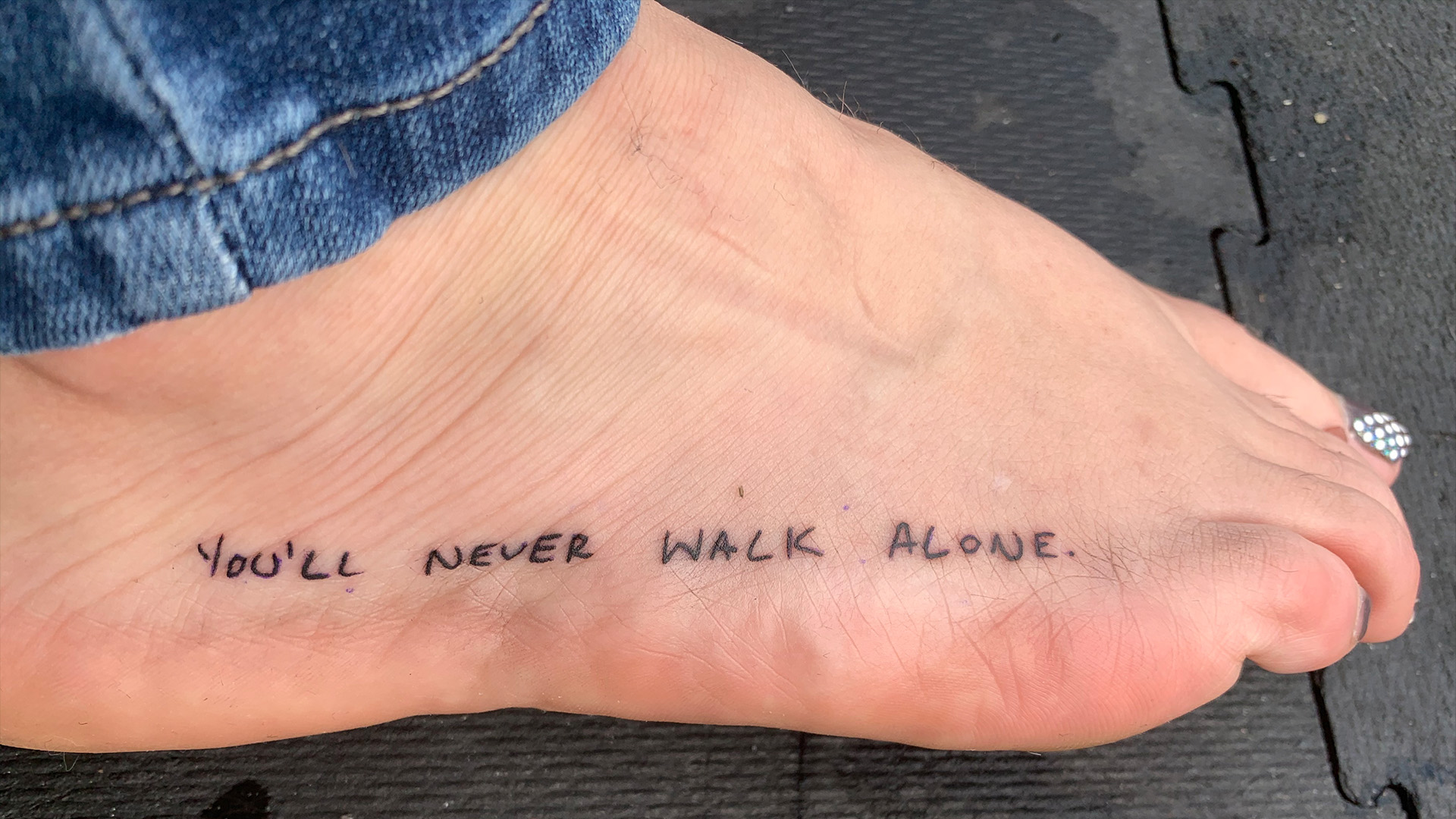 Lauren Buckland got a tattoo on her foot that handwriting of her son, Coast Guardsman Scott Haliburton.
