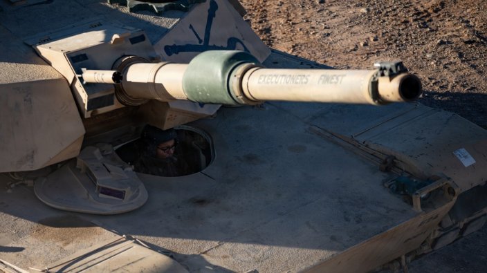 A U.S. Army Soldier assigned to 1st Cavalry Regiment, 1st Armored Brigade Combat Team, 1st Armored Division, drives to a firing lane to zero an M1A2 Abrams Tank at Dona Ana Range Complex, New Mexico, Nov. 17, 2025. The event was part of the Iron Heroes Competition, designed to identify the best individuals and teams in the 1st Armored Division to compete at higher Army echelon competitions. (U.S. Army photo by Sgt. Jerron Bruce)