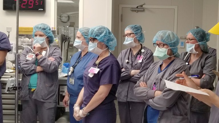 Feature Art:  WATERTOWN, N.Y. – Labor and delivery nurses from the Samaritan Medical Center in Watertown, N.Y., observe as Army and civilian health care professionals train to stop life-threatening complications of a simulated mother who just gave birth during a training simulation at the Samaritan Medical Center June 7. Obstetrics and gynecology health care professionals from Fort Drum, N.Y. work side by side with their civilian counterparts at Samaritan to provide pregnancy, labor and delivery care to Fort Drum service members and their families. (Photo by Warren W. Wright Jr., Fort Drum MEDDAC Public Affairs) 