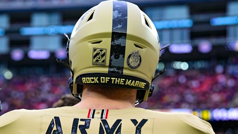 A cadet and football player from the United States Military Academy at West Point looks at a play on the field at the 124th Army Navy Game at Gillette Stadium in Foxborough, MA., Dec. 9, 2023. (U.S. Army photo by Sgt. David Resnick)