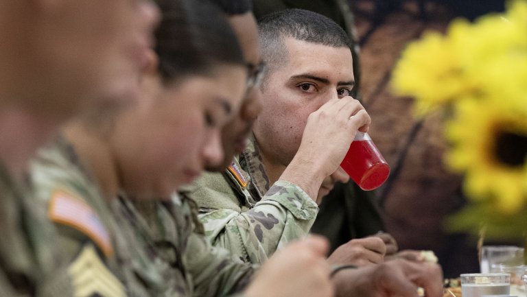 Soldiers with the U.S. Army Institute for Religious Leadership eat their Thanksgiving meals at the U.S. Army Drill Sergeant Academy dining facility, Nov. 27, 2024.