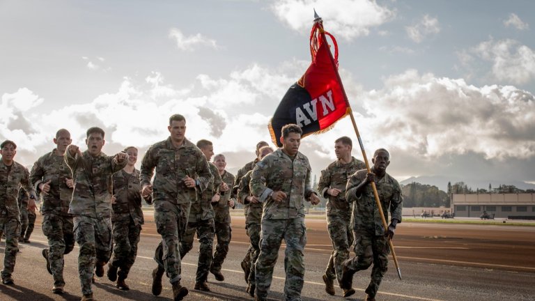Leaders from the 25th Combat Aviation Brigade run as part of a brigade wide workout in honor of opening the Maj. General Frank W. Tate Soldier Performance Readiness Center at Wheeler Army Airfield, O’ahu, Hawai’i, July 1, 2025. The mission of Holistic Health and Fitness, also known as H2F, is to empower soldiers to take charge of their health by focusing on five key domains: physical, mental, nutrition, sleep, and spiritual readiness. (U.S. Army photo by Sgt. Olivia Cowart)
