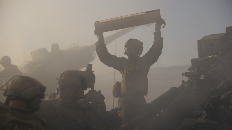 U.S. Marines with 2nd Battalion, 11th Marine Regiment, 1st Marine Division, reload an M777 lightweight 155mm howitzer during a rehearsal for the 250th Amphibious Capabilities Demonstration at Red Beach combat town, Marine Corps Base Camp Pendleton, Oct. 17, 2025. The 250th Amphibious Capabilities Demonstration at Camp Pendleton marks the Marine Corps’ 250th birthday and America’s Semiquincentennial. The live-fire event highlights the Navy-Marine Corps team’s ability to integrate across air, land, and sea, showcasing the Corps’ enduring role as America’s force in-readiness. (U.S. Marine Corps photo by Gunnery Sgt. Aaron S. Patterson)