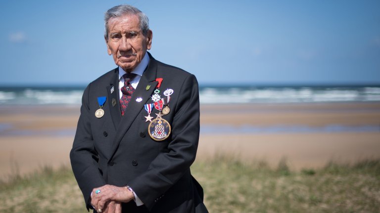World War II veteran Charles Norman Shay, a Penobscot Native American, who took part in the Operation Overlord (Battle of Normandy) during the D-Day on June 6, 1944, poses on May 4, 2019 in Omaha Beach, western France. (Photo by LOIC VENANCE / AFP) (Photo credit should read LOIC VENANCE/AFP via Getty Images)