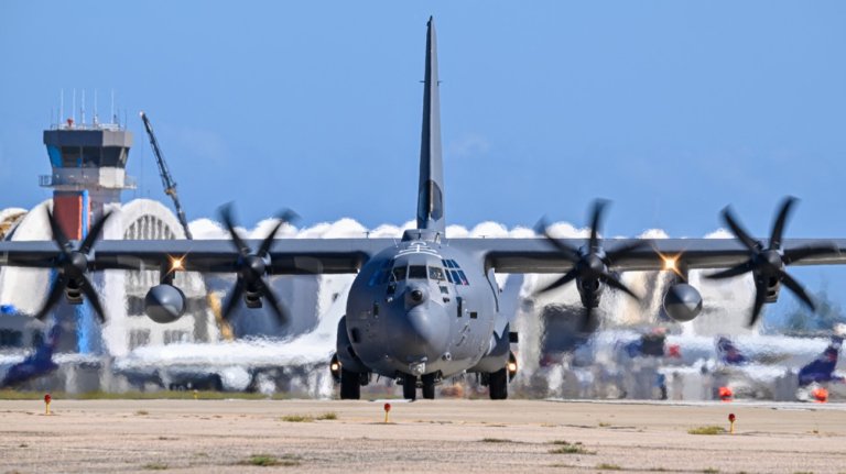 A US Air Force C-130 Hercules taxis at Rafael Hernandez Airport in Aguadilla, Puerto Rico, on December 18, 2025. US President Donald Trump's administration is conducting a military campaign in the Caribbean and eastern Pacific, deploying naval and air forces for what it calls an anti-drugs offensive. (Photo by Miguel J. Rodriguez Carrillo / AFP via Getty Images)