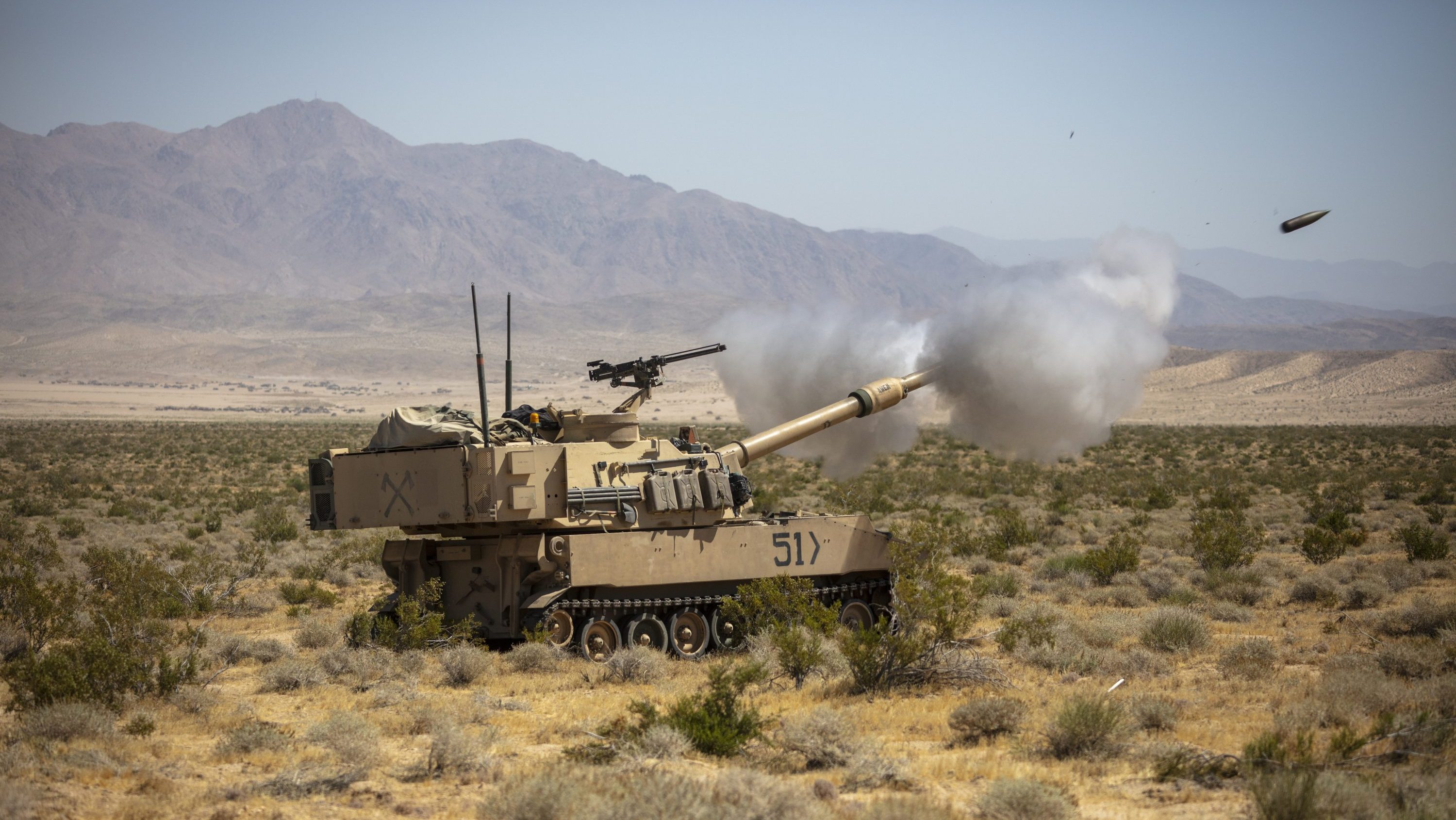 U.S. Soldiers assigned to 4th Battalion, 1st Field Artillery Regiment, 3rd Armored Brigade Combat Team, 1st Armored Division perform M109 Howitzer calibration operations during Rotation 24-08 at the National Training Center, Fort Irwin, Calif., May 29, 2024. (U.S. Army photo by Spc. James Robinson, Operations Group, National Training Center)