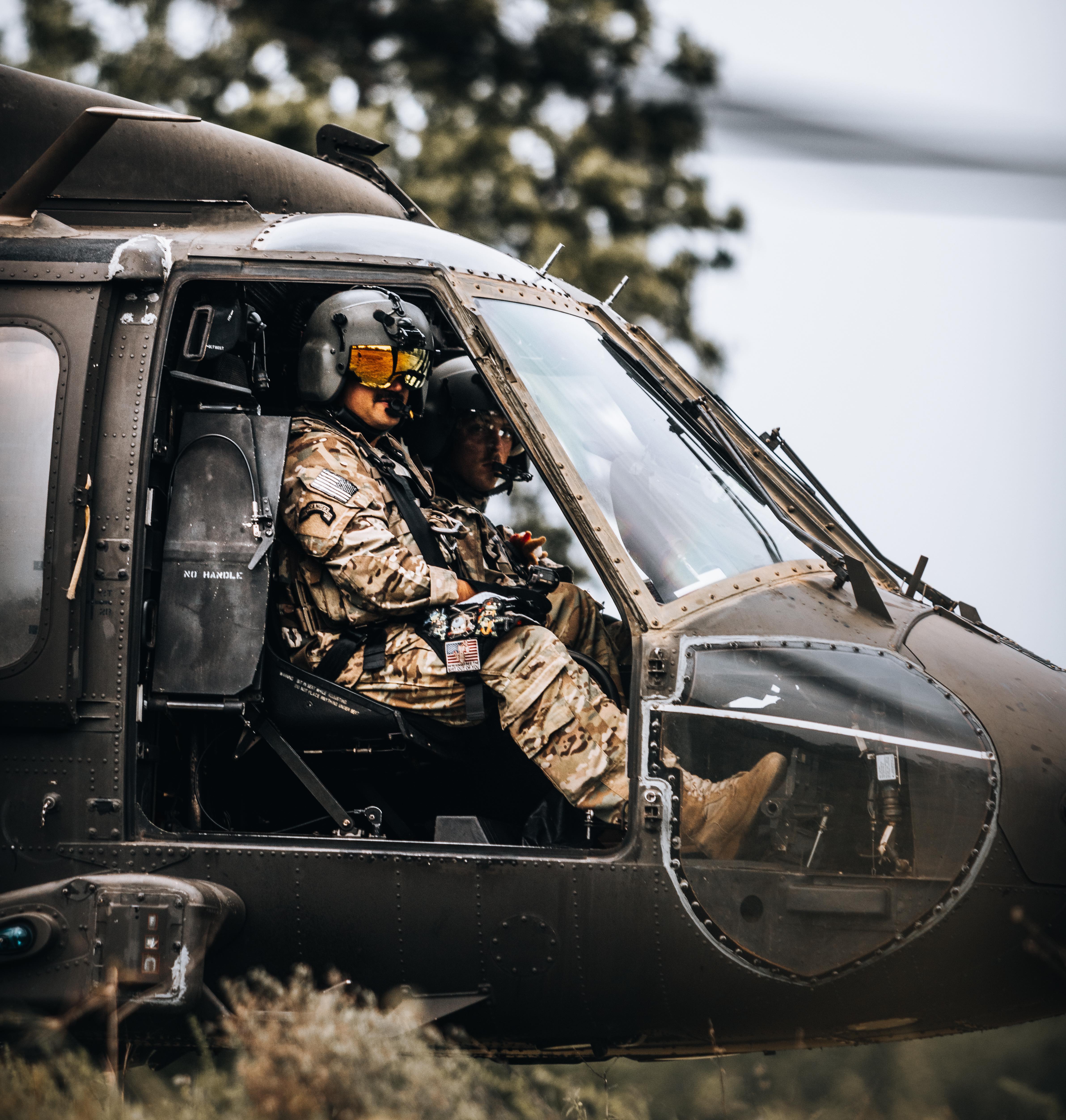 UH-60 Black Hawk helicopter pilots, assigned to 2nd Battalion, 25th Combat Aviation Brigade, prepare to take-off and start their next training iteration as part of an aerial gunnery during Hanuman Guardian 22, Lop Buri, Kingdom of Thailand, Mar. 16, 2022. Working together, the U.S. Army and the Royal Thai Army conduct multinational, combined task force events that are vital to maintaining the readiness and interoperability of security forces across the region. (U.S. Army photo by Staff Sgt. Timothy Hamlin)