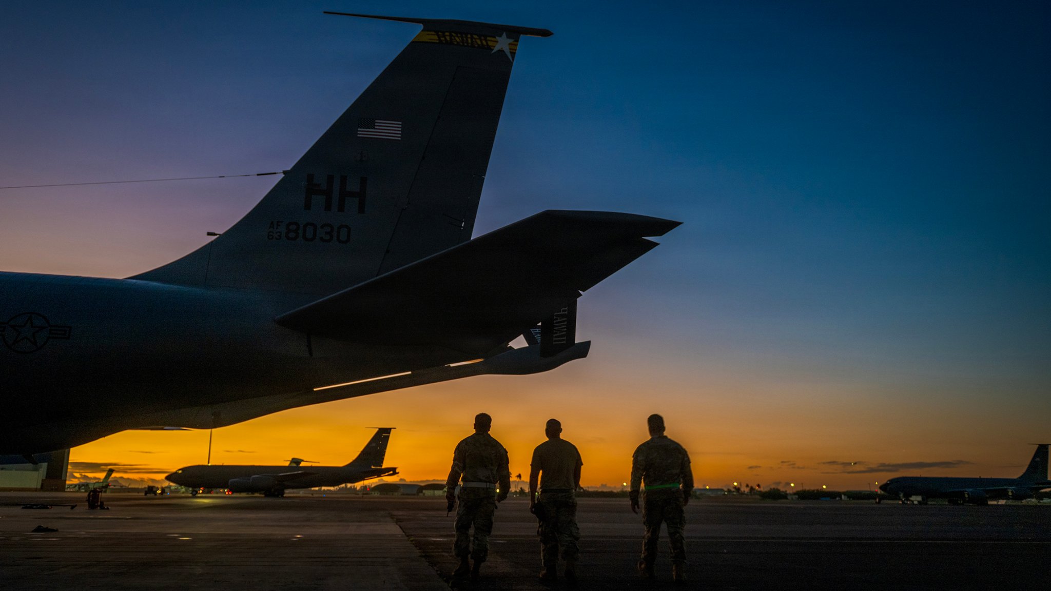 Hawaii Air National Guard Airmen conduct maintenance on a KC-135 Stratotanker at dawn prior to an aerial refueling mission at Joint Base Pearl Harbor-Hickam, Hawaii, Dec. 1, 2025. The 203rd Air Refueling Squadron provides critical aerial refueling capabilities in support of U.S. Indo-Pacific Command operations and global mobility missions worldwide. (U.S. Air National Guard photo by Senior Master Sgt. Mysti Bicoy