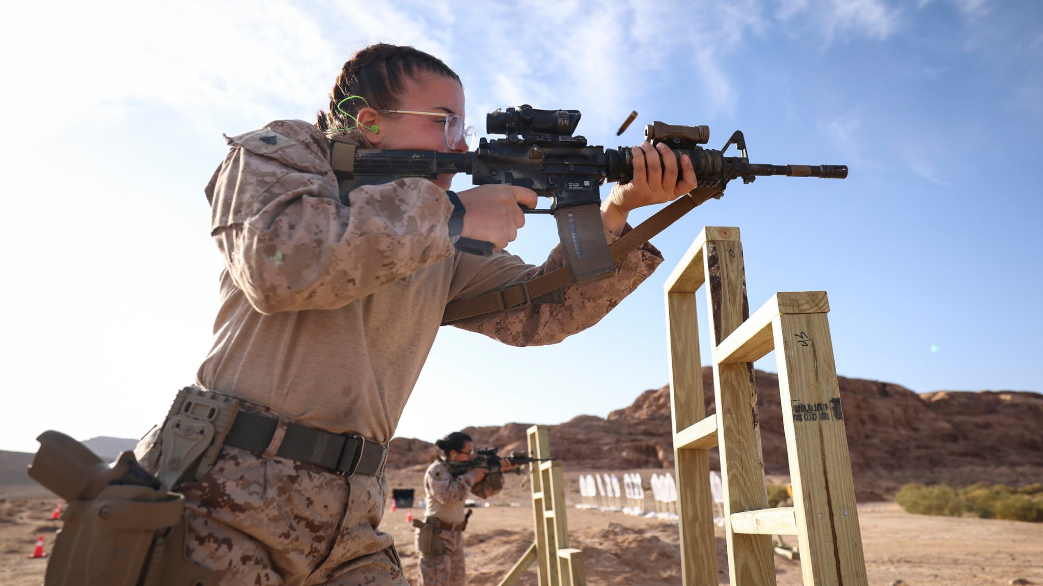 U.S. Marine Corps Cpl. Alexandra Cahall, a combat marksmanship coach assigned to 25th Marine Regiment, U.S. Marine Corps Forces Reserve, fires a rifle during an all-female marksmanship subject matter expert exchange between U.S. Marines and Jordanian Soldiers during Intrepid Maven 25.1 in Al-Quwayrah, Jordan, Oct. 29, 2024. The second iteration of this exchange between U.S. and Jordanian female engagement teams was nested in Intrepid Maven 25.1 and represents a step forward in strengthening military cooperation and promoting Women, Peace, and Security initiatives. (U.S. Marine Corps photo by Sgt. Angela Wilcox)