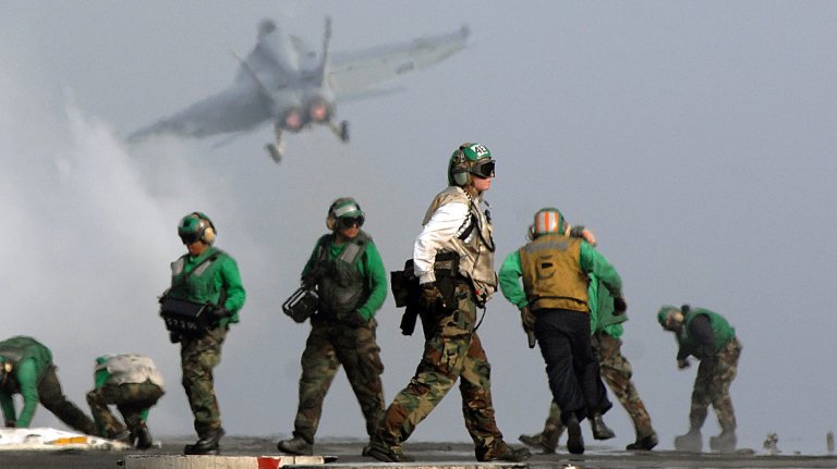 U.S. Navy flight deck personnel prepare to launch the next aircraft in the launch cycle after successfully catapulting an F/A-18 Hornet aircraft from the aircraft carrier USS Harry S. Truman (CVN 75) during flight operations in the Persian Gulf on March 26, 2008. Truman and embarked Carrier Air Wing 3 are deployed supporting Operations Iraqi Freedom, Enduring Freedom and maritime security operations. (DoD photo by Seaman Apprentice Matthew A. Lawson, U.S. Navy. (Released))