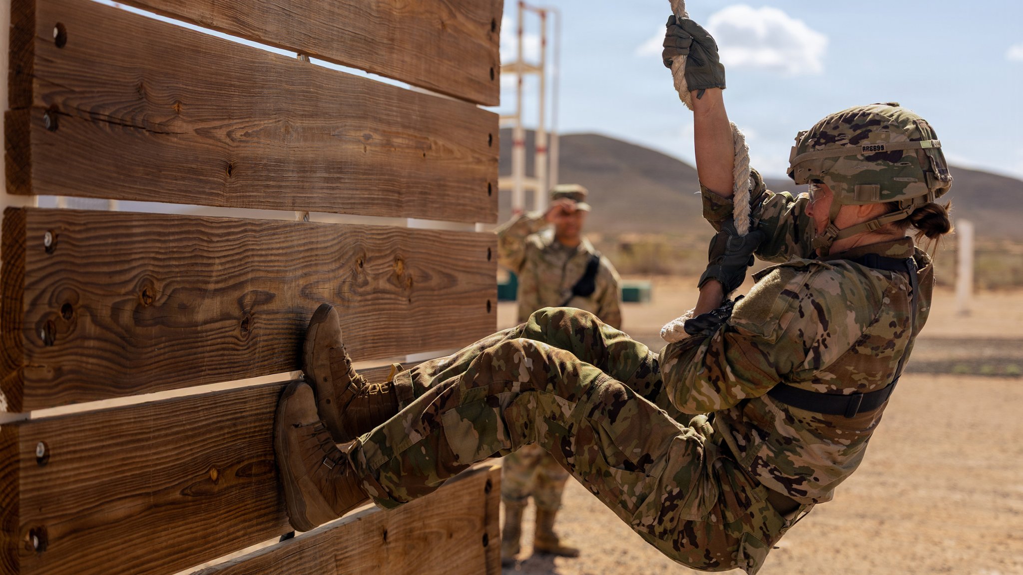 U.S. Army Staff Sgt. Ruby Russo, a wheeled vehicle mechanic assigned to 2nd Battalion, 43rd Air Defense Artillery Regiment, 11th Air Defense Artillery Brigade, climbs a rope obstacle during the obstacle course event of the Blackjack Warrior Competition at McGregor Range, N.M., May 5, 2025. The competition tested Soldiers’ physical fitness, endurance and mental toughness while reinforcing overall unit readiness. (U.S. Army photo by Sgt. JaDarius D. Duncan)