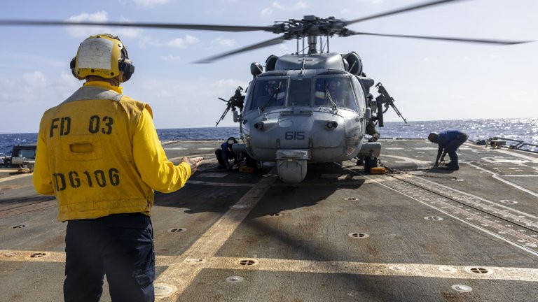 U.S. Sailors, assigned to Arleigh Burke-class guided-missile destroyer USS Stockdale (DDG 106) and Helicopter Sea Combat Squadron 9, conduct flight operations while operating in the Atlantic Ocean, Dec. 20, 2025. U.S. military forces are deployed to the Caribbean in support of the U.S. Southern Command mission, Department of War-directed operations, and the president’s priorities to disrupt illicit drug trafficking and protect the homeland. (U.S. Navy photo)