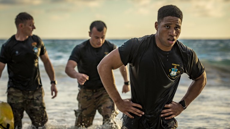 U.S. Army Soldiers with 1st Battalion, 21st Infantry Regiment, 2nd Infantry Brigade Combat Team, 25th Infantry Division, hold a memorial PT challenge Jan. 22, 2022 at the Honolulu Polo Club and Bellows Beach in Honolulu, Hawaii in honor of 1st Lt. Nainoa Hoe and the regiment’s fallen Gimlets in Iraq and Afghanistan. On January 22, 2005, 1st Lt. Nainoa Hoe, a native of Kailua, Hawaii, was shot and killed by a sniper as he led a foot patrol through Mosul, Iraq. On the anniversary of Hoe’s death, Soldiers carried water cans, conducted an ACFT challenge, swam on a ruck raft, and high crawled through the sand to build teamwork and remember the sacrifice of the Gimlets before them. (U.S. Army photo by Staff Sgt. Thomas Calvert)