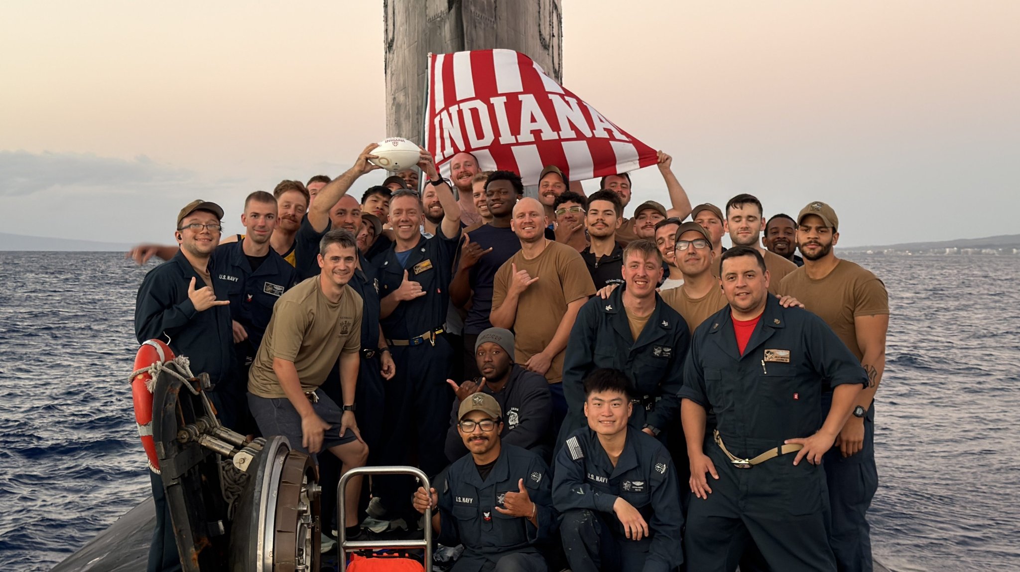 The crew of the USS Indiana fast-attack submarine snapped a celebratory photo after the Indiana Hoosiers won the college football national championship Monday night.