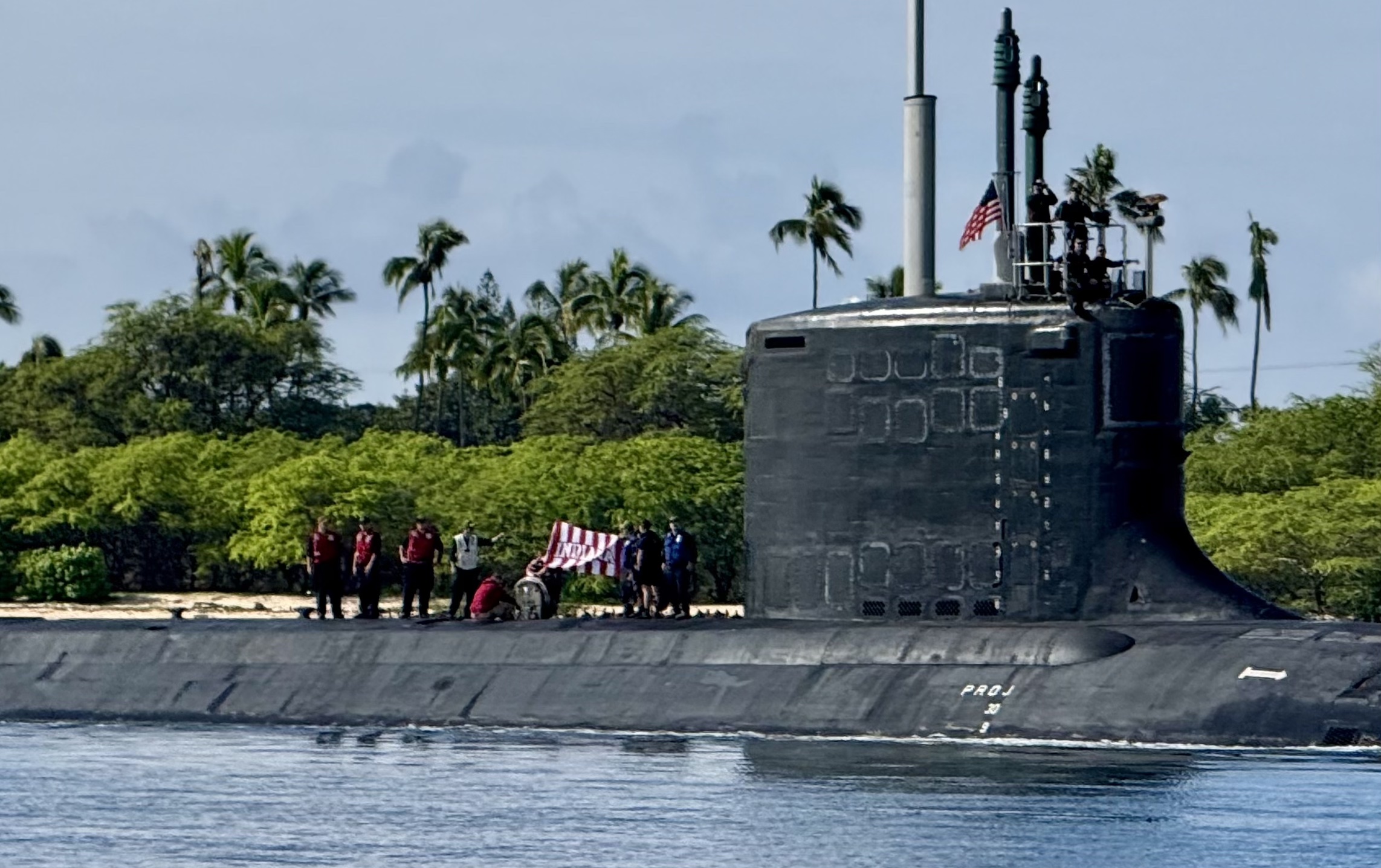 The crew of the USS Indiana unfurl their Hoosier-theme Indiana flag at Pearl Harbor, Hawaii earlier this year.