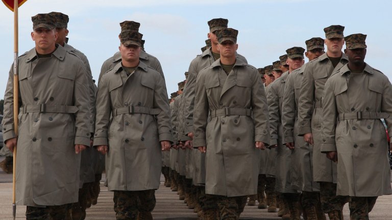 Lance Cpl Mariano Barbosa, honor graduate, Hotel Company, leads his platoon out to the forming area aboard Marine Corps Recruit Depot San Diego, Ja.n 10. This will be the first time that the new Marines will have seen their familes since beginning Marine Corps basic training.