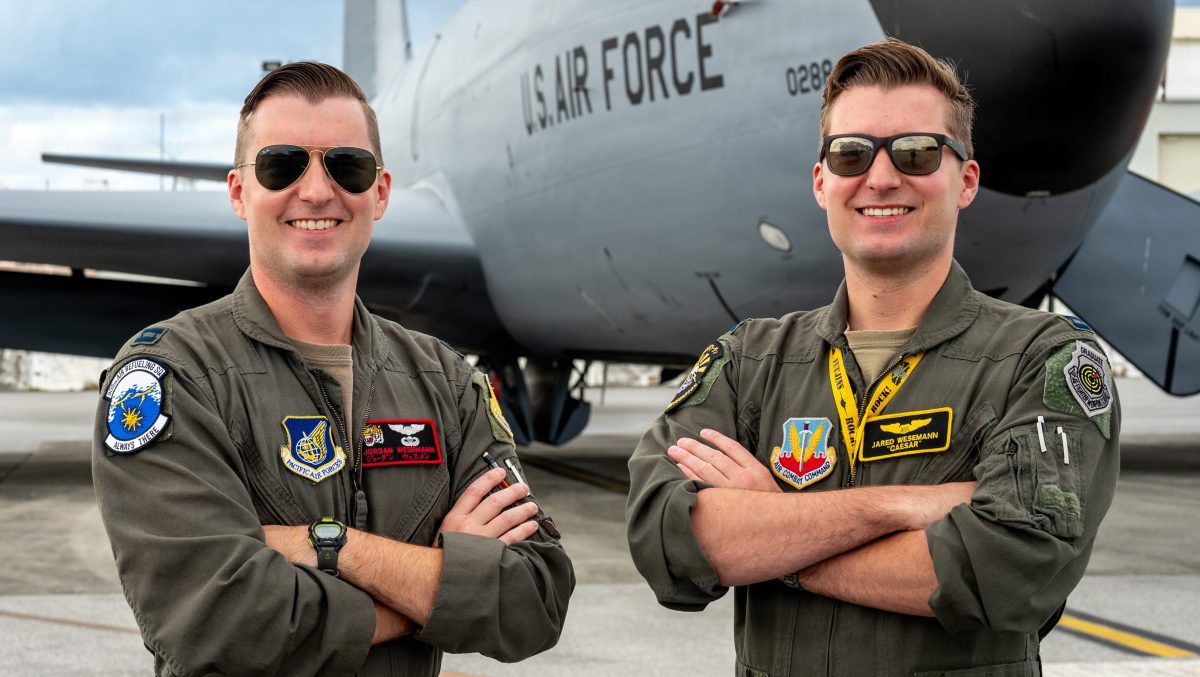 Twin Air Force pilots connect in refueling flight over the Pacific