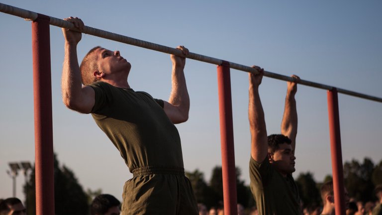 Candidates with Lima and India Company, Officer Candidate School (OCS) perform their initial Physical Fitness Test aboard Marine Corps Base Quantico, Va., May 24, 2016. The mission of OCS is to educate and train officer candidates in order to evaluate and screen individuals for qualities required for commissioning as a Marine Corps officer. (U.S. Marine Corps Combat Camera photo by Cpl. Laura Mercado/Released)